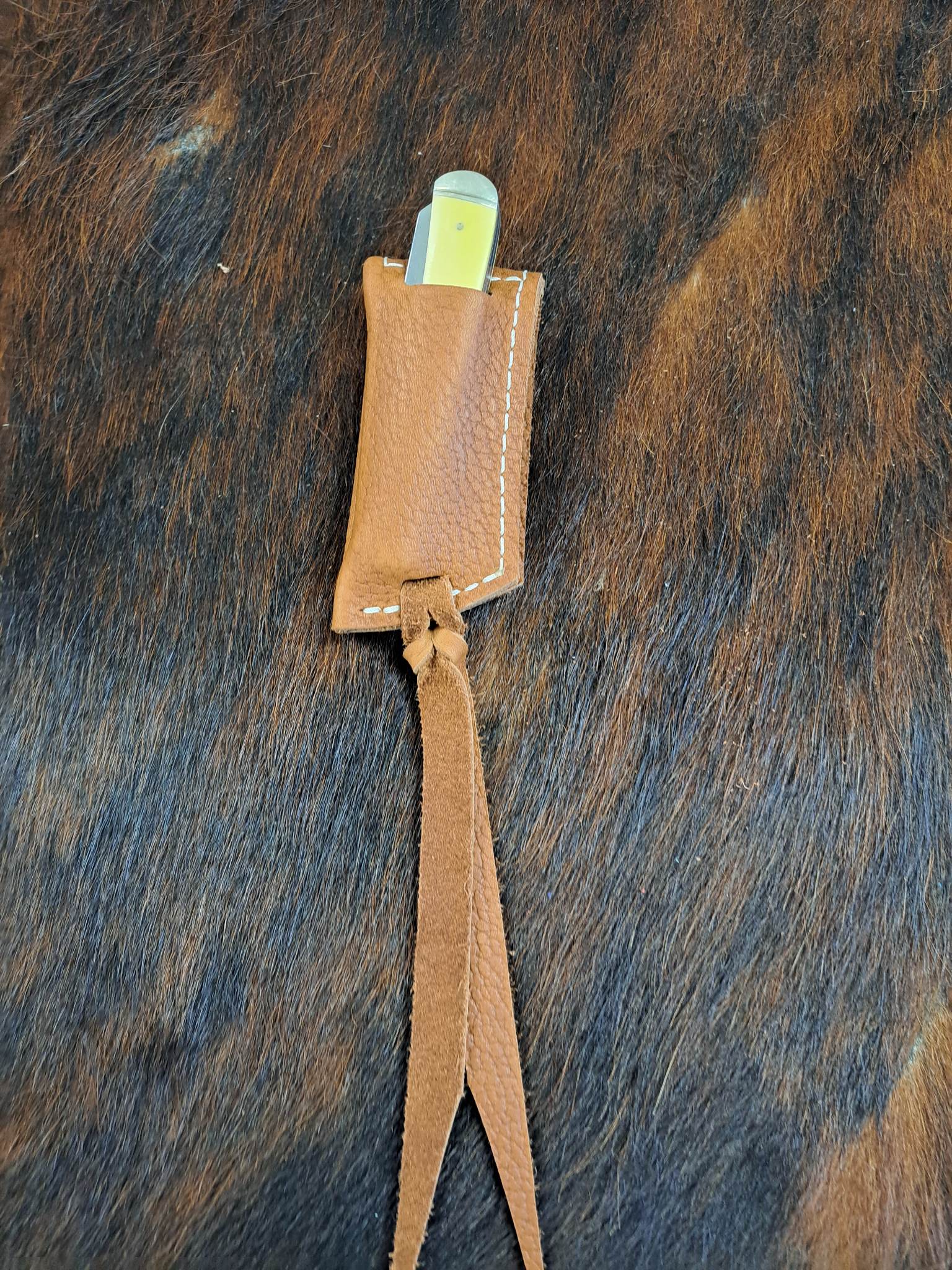 ONE FEATHER TRAPPER STYLE KNIFE SHEATHS